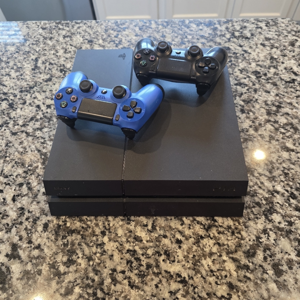 Sony PS4 Console Black and Blue DualShock Controllers